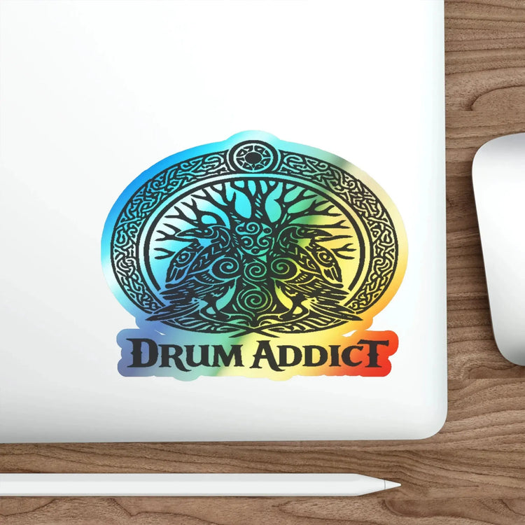 Holographic Drum Addict die-cut sticker featuring a Celtic tree drum design on paper, vibrant holographic finish.