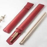Black Drum Addict Apparel drum stick holster by Yggdrasils Wood, 44x6cm, designed to hold drum sticks securely.