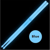 Colorful fluorescent drum sticks from Drum Addict Apparel by Yggdrasils Wood, showing vibrant blue tips and bright design.