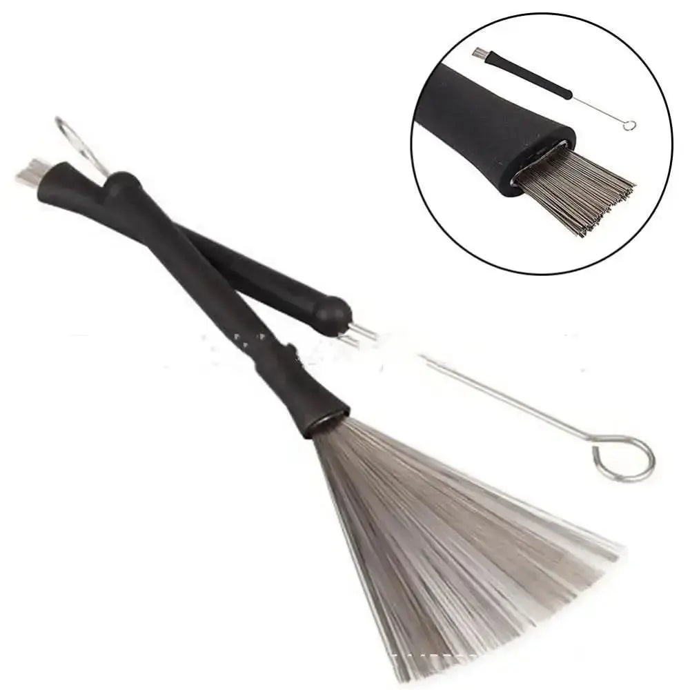 Drum Addict Apparel drum kit wire brushes with black handles and metal bristles for cleaning and maintenance of drums.