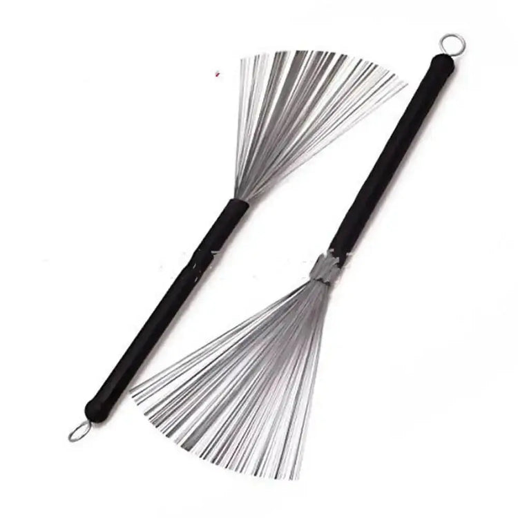 Drum Addict Apparel drum kit wire brushes with metal handles and bristles, designed for cleaning and maintaining drum kit hardware.