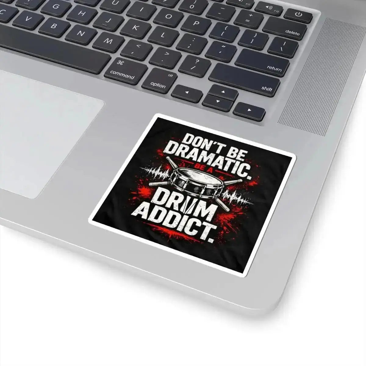 Drum Addict Kiss-Cut Decal from Drum Addict Apparel by Yggdrasils Wood, 2x2 inches, featuring bold drum-themed design.