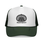 Black Drum Addict Apparel trucker cap featuring the Drum Addict logo, crafted by Yggdrasils Wood, with adjustable mesh back.