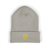 Black embroidered gold sun classic cuffed beanie by Drum Addict Apparel, featuring detailed sun embroidery and a comfortable fit.