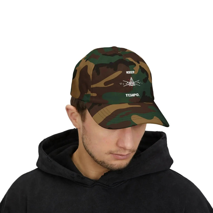 Black military camouflage baseball hat by Drum Addict Apparel with adjustable strap and branded logo.