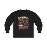 Red long-sleeve tee from Printify with "Embrace The Suck" slogan, featuring comfortable fabric and casual fit.