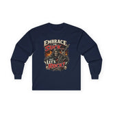 Red Printify long-sleeve tee featuring "Embrace The Suck" graphic printed on the front.