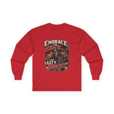 Red long-sleeve tee from Printify with "Embrace The Suck" slogan, featuring casual fit and comfortable fabric.