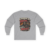 Red Printify Embrace The Suck long sleeve T-shirt with bold text, made from comfortable fabric, featuring a casual fit.