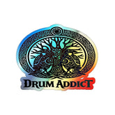 Holographic Drum Addict die-cut sticker featuring a Celtic tree drum design on paper, with vibrant holographic finish.