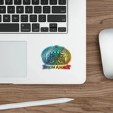 Holographic Drum Addict die-cut sticker featuring a Celtic tree drum design on paper product, vibrant and shiny surface.