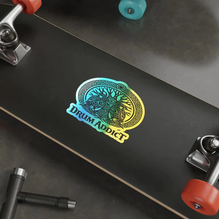 Holographic Drum Addict die-cut sticker featuring a Celtic tree drum design on shiny paper, perfect for decorating.