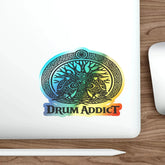 Holographic Drum Addict die-cut sticker featuring a Celtic tree drum design on paper, with vibrant holographic finish.