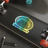 Holographic Drum Addict die-cut sticker featuring a Celtic tree drum design on paper, vibrant holographic finish.