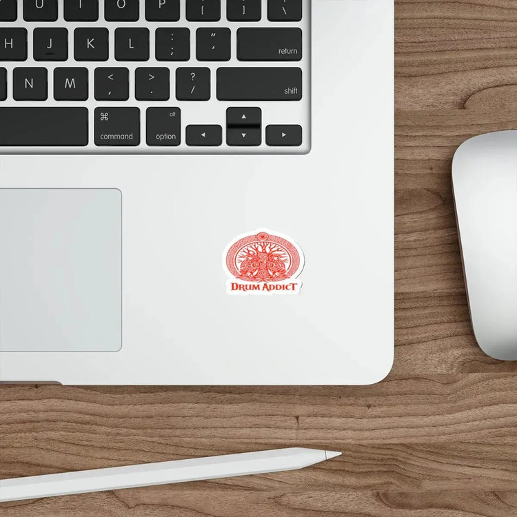 Red Celtic drum tree design die-cut sticker on white paper, featuring Drum Addict branding, 2x2 inches.