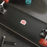 Red Celtic drum tree die-cut sticker from Drum Addict, featuring intricate drum design on white paper, ideal for decorating.